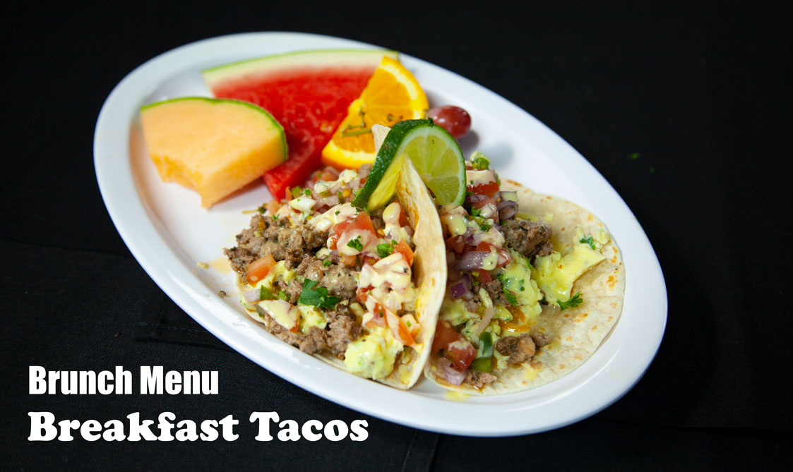 Tacos with ground beef, eggs, and salsa